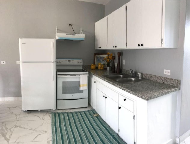 San Gil Apartments Kitchen Guam San Gil Apartments Kitchen with range and refrigerator